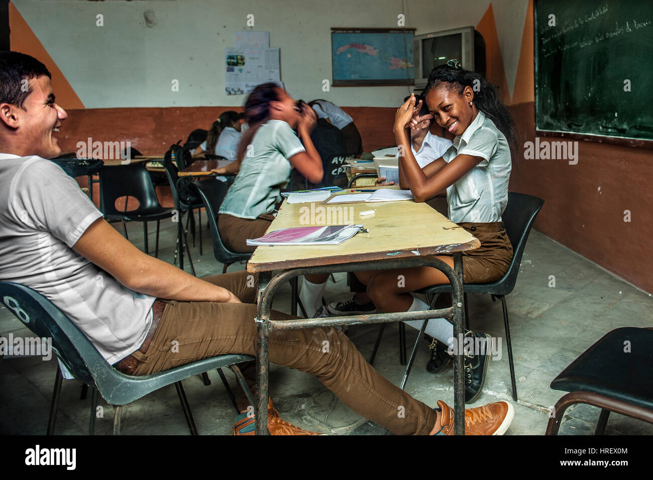 Students in a class delighting during the playtime, Trinidad, Cuba Stock Photo