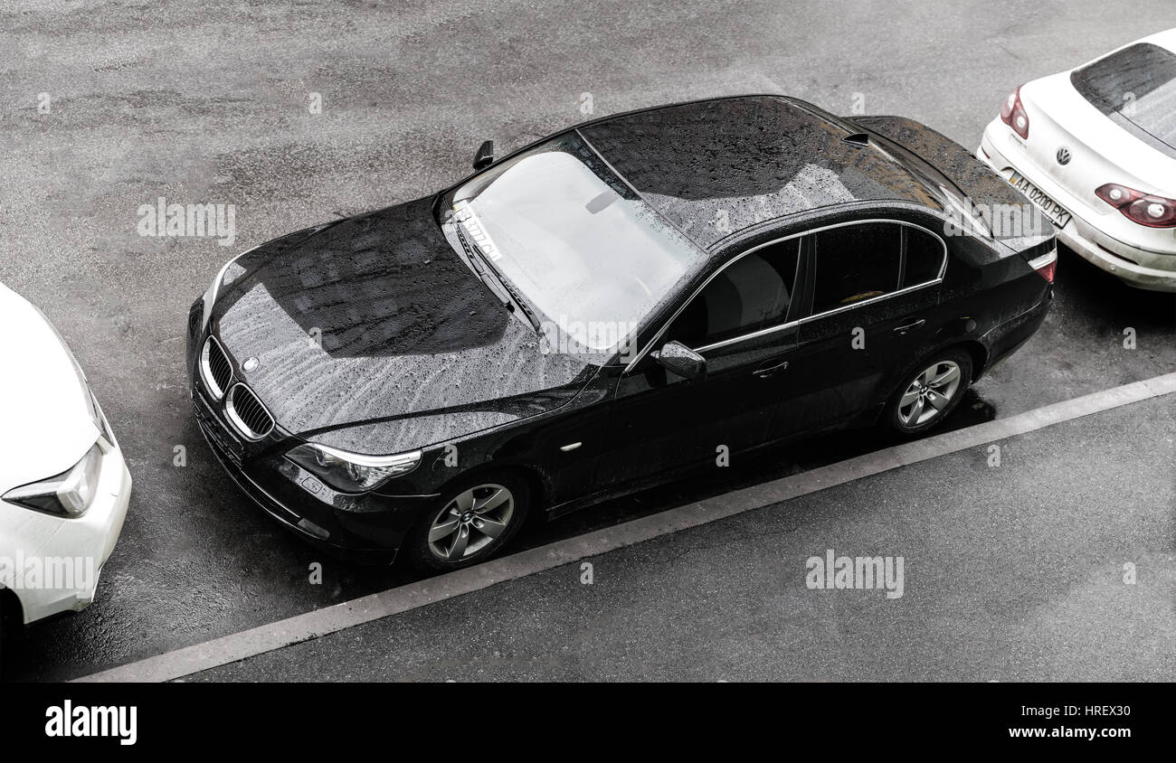 Kyiv, Ukraine - December 10th, 2016: The black BMW 5 Series E60. Top view Stock Photo