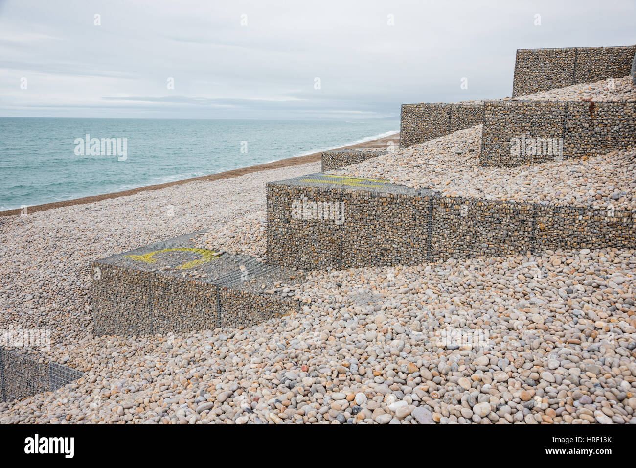 New (2016) coastal defence workings on the Chesil Beach, Portland, Dorset UK coast shore Stock Photo