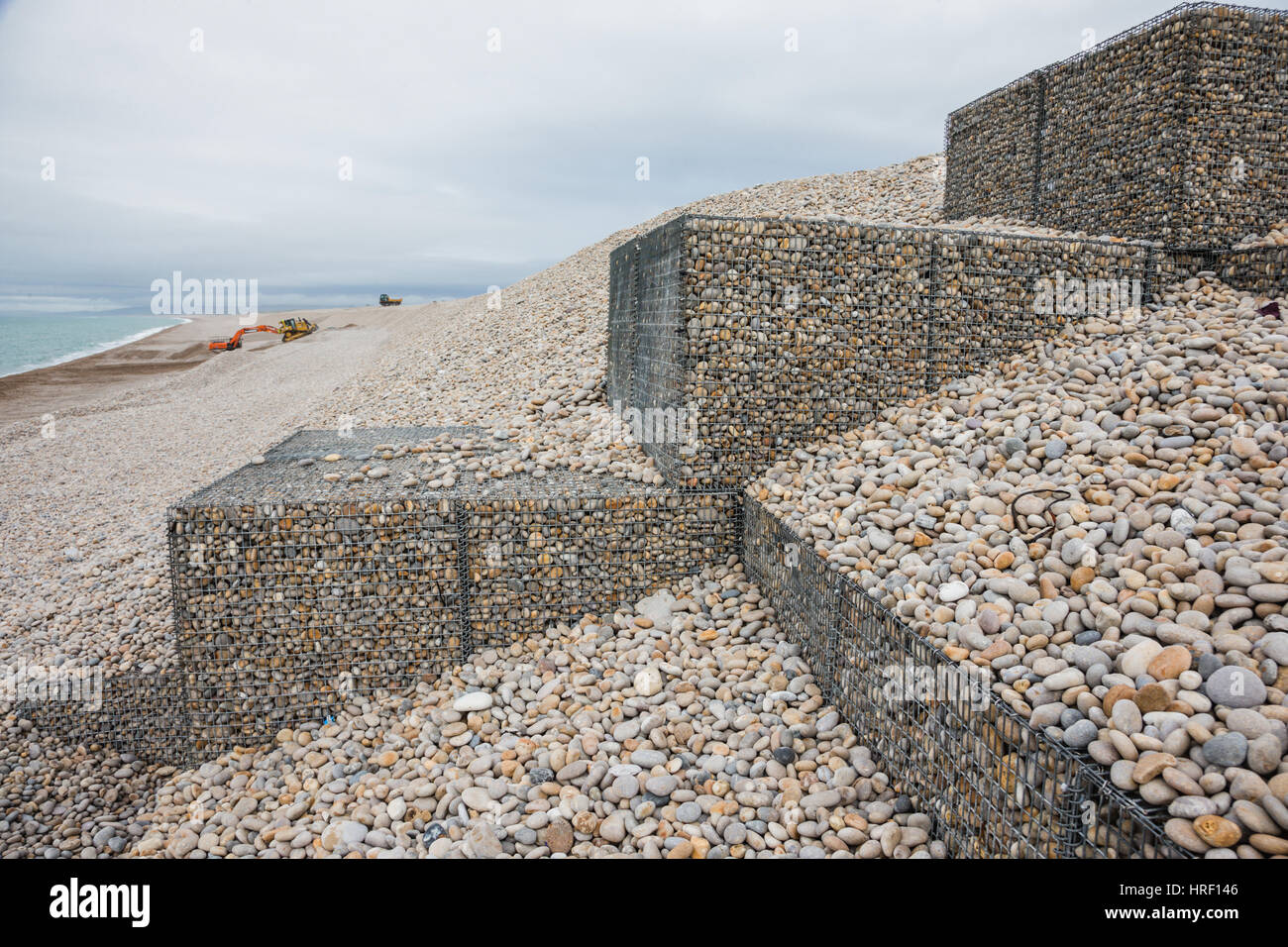 New (2016) coastal defence workings on the Chesil Beach, Portland, Dorset UK coast shore Stock Photo