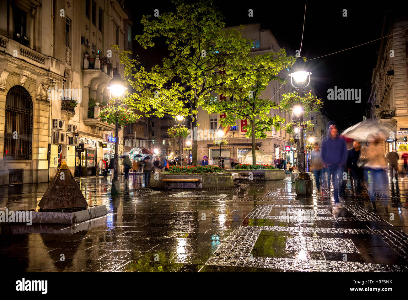 BELGRADE, SERBIA - SEPTEMBER 25: Rainy inght at Knez Mihailova Street on September 25, 2015 in Belgrade, Serbia. Street is the main shopping mile of B Stock Photo
