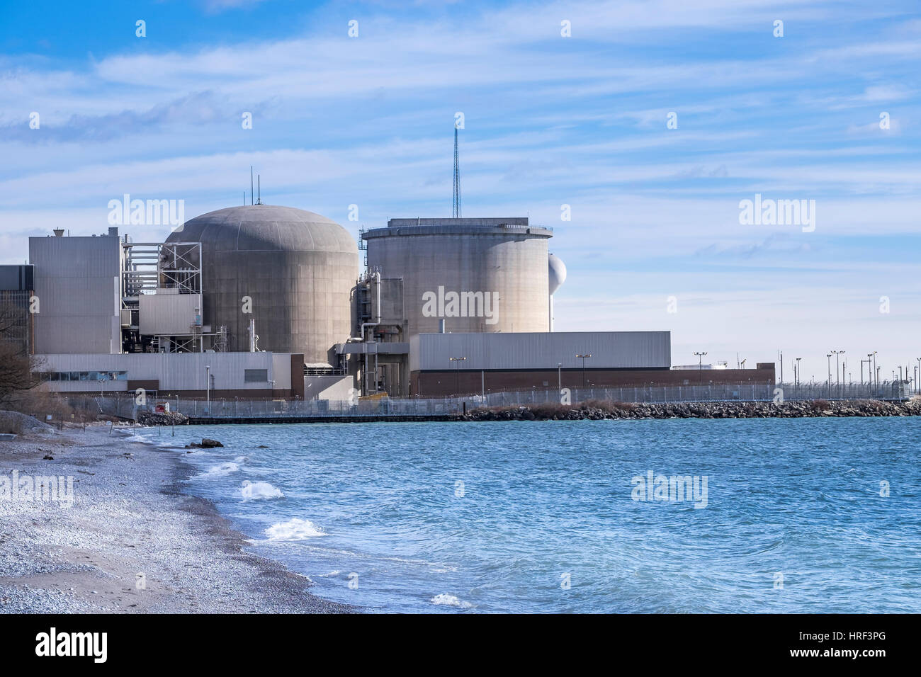 Pickering Nuclear Generating Plant, as seen from the shore of Lake Ontario, is located in  Pickering a city just outside of Toronto Canada. Stock Photo