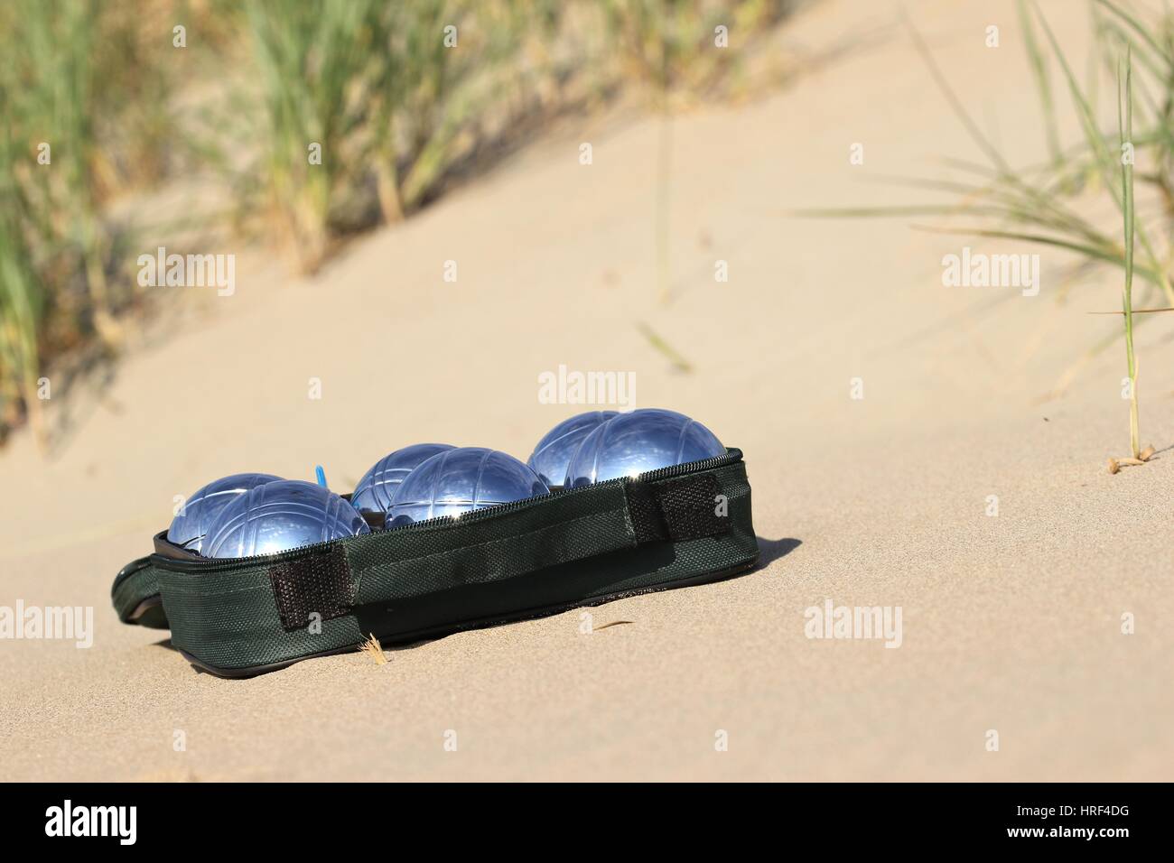 bocce balls on sandy beach Stock Photo Alamy