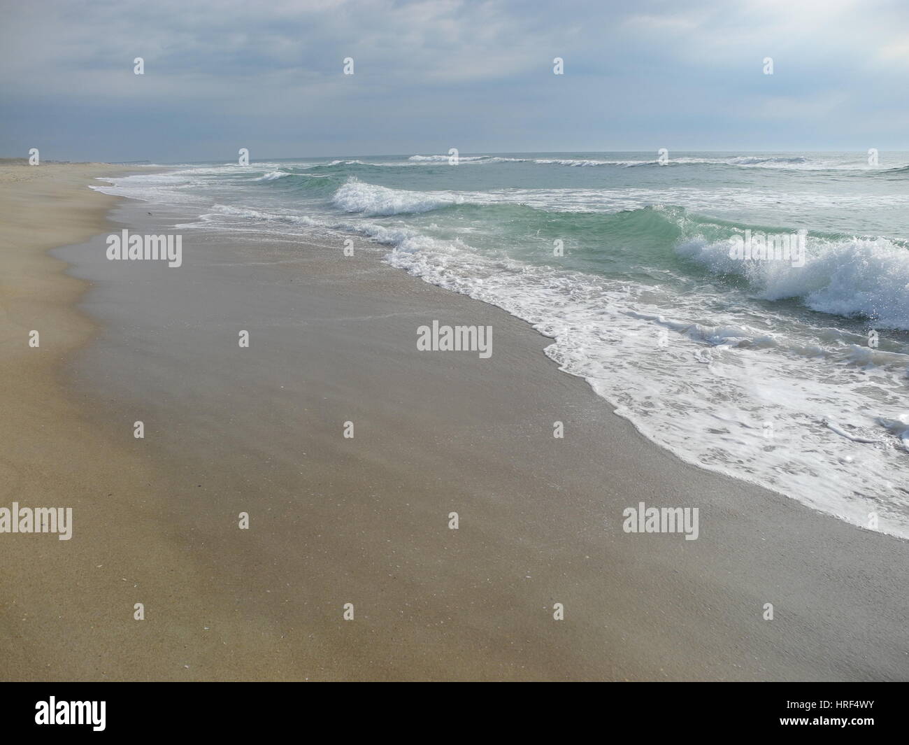 Breaking waves surf on the beach, Outer Banks, North Carolina Stock