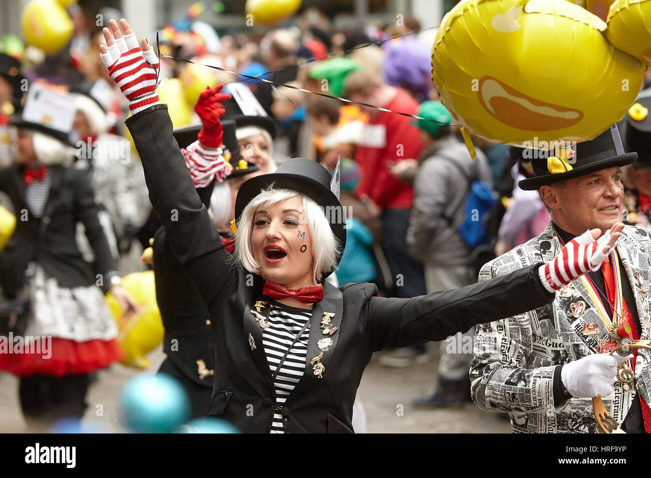 People in costumes celebrate Carnival, Rosenmontag parade Koblenz, Rhineland-Palatinate, Germany Stock Photo