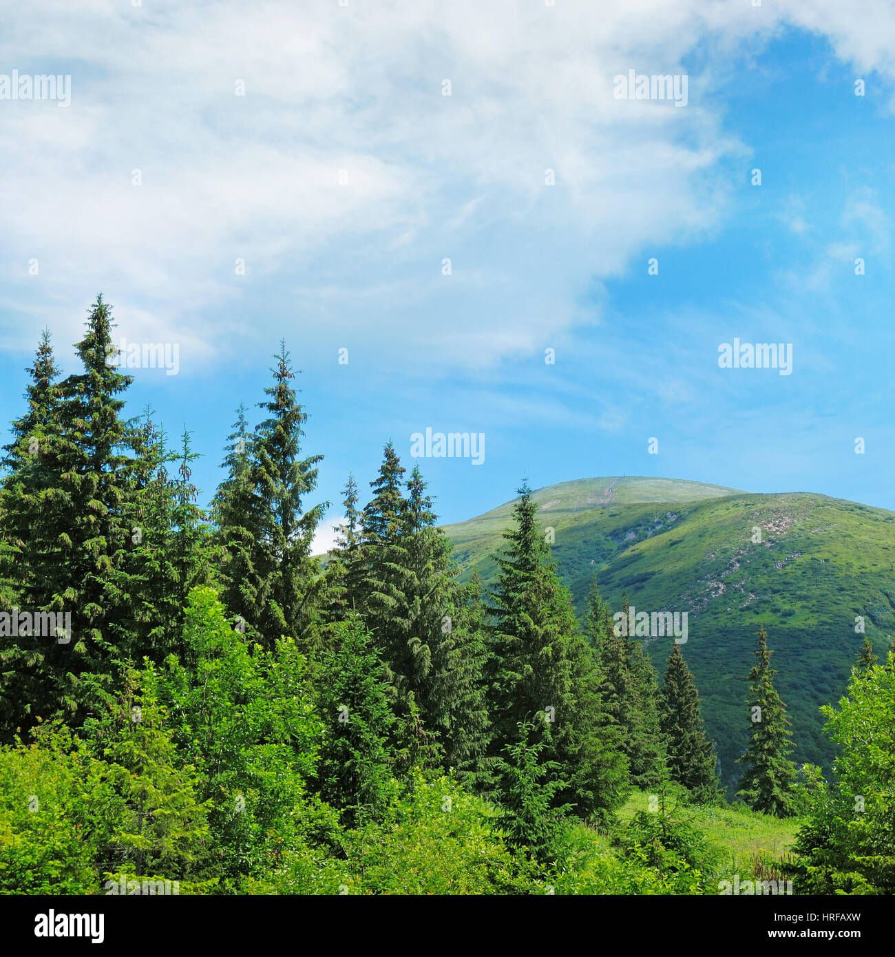 scenic mountain peaks against the blue sky Stock Photo