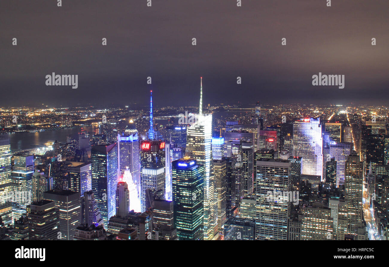 Aerial view of New York City at night with illuminated avenues Stock ...