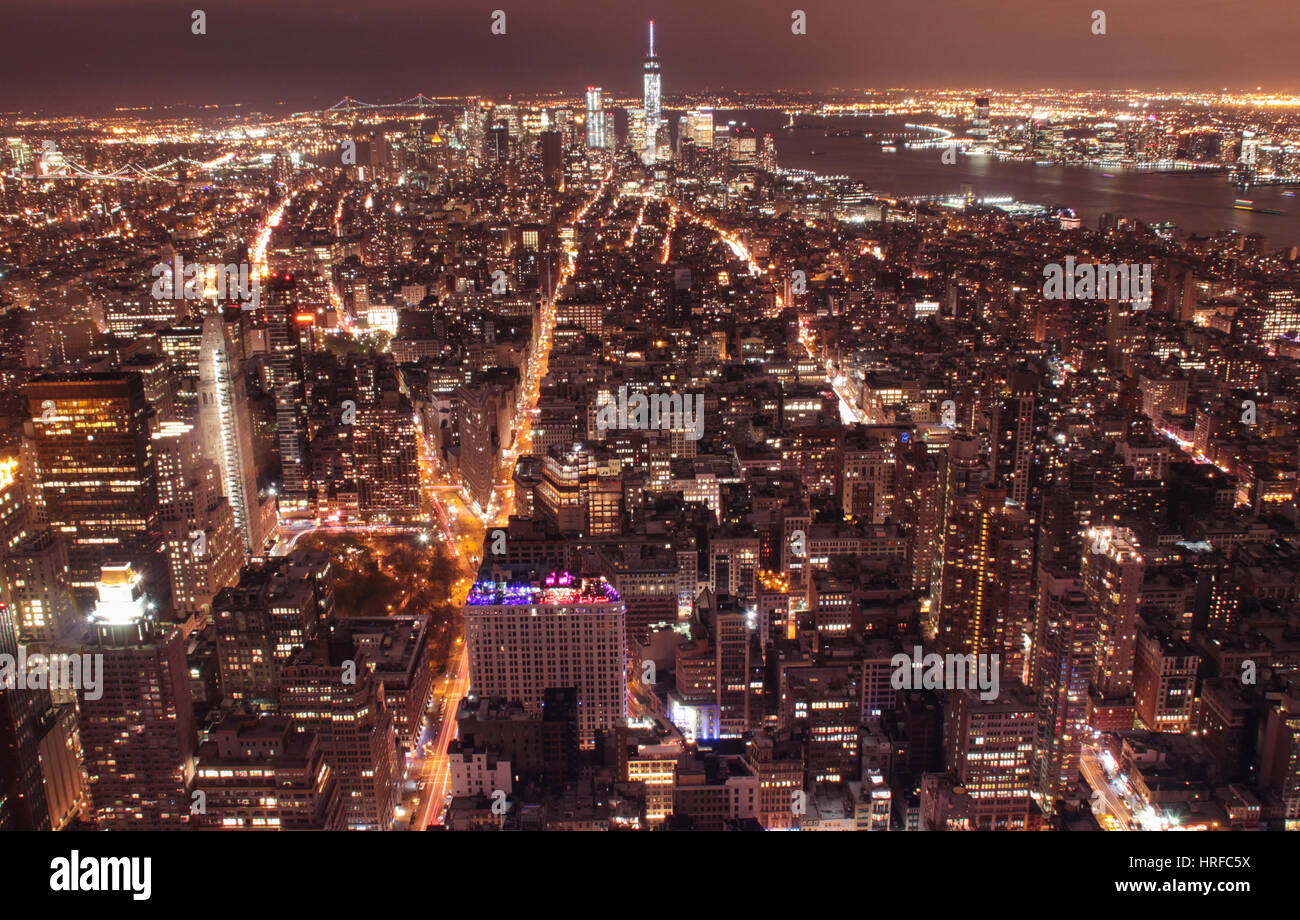Aerial view of New York City at night with illuminated avenues Stock ...