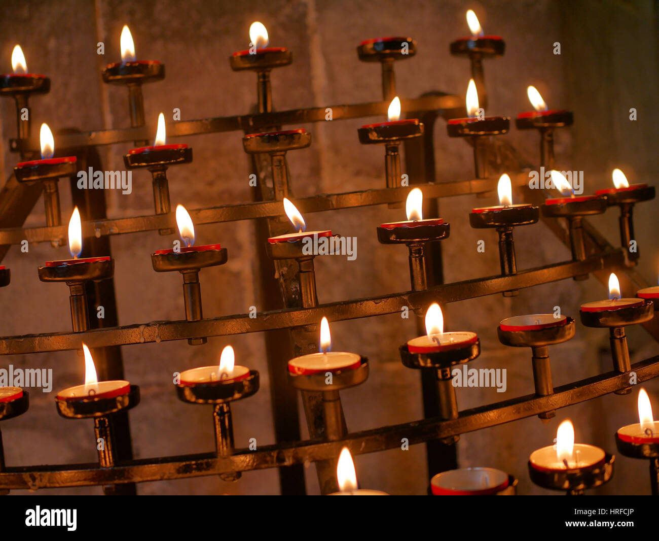 Prayer candles in St. Davids Cathedral, Wales UK. Stock Photo