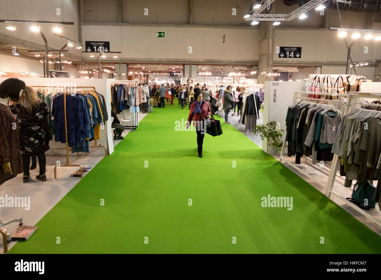 Aisle with fashion clothing stands in International fashion trade show MOMAD Ifema 2017. Madrid (Spain). Stock Photo