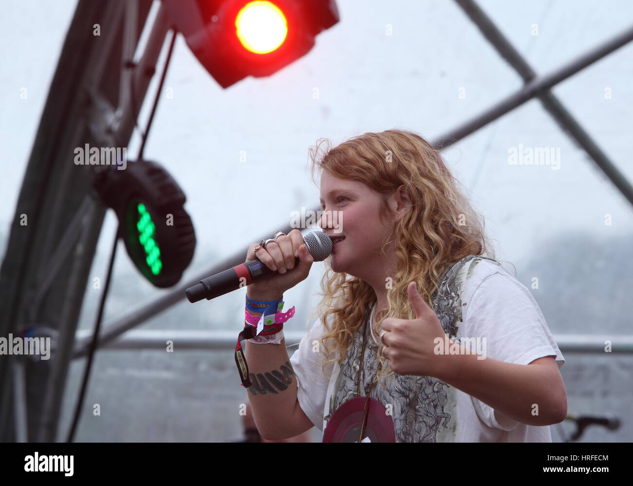 Kate Tempest the poet with a hand held microphone at Bestival 2011 Stock Photo