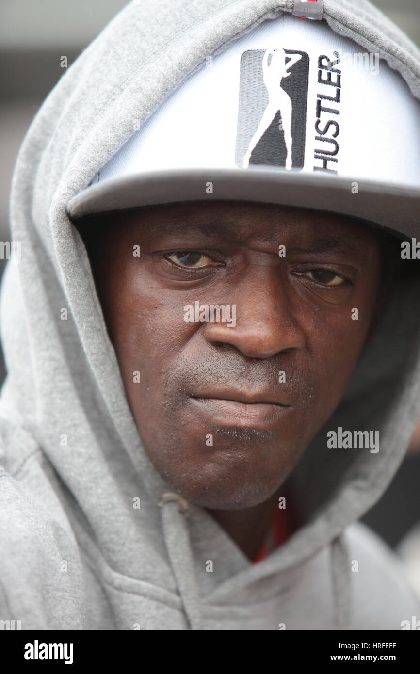 Flavor Flav of Public Enemy at Bestival 2011 wearing a grey hoodie close up looking straight into camera Stock Photo