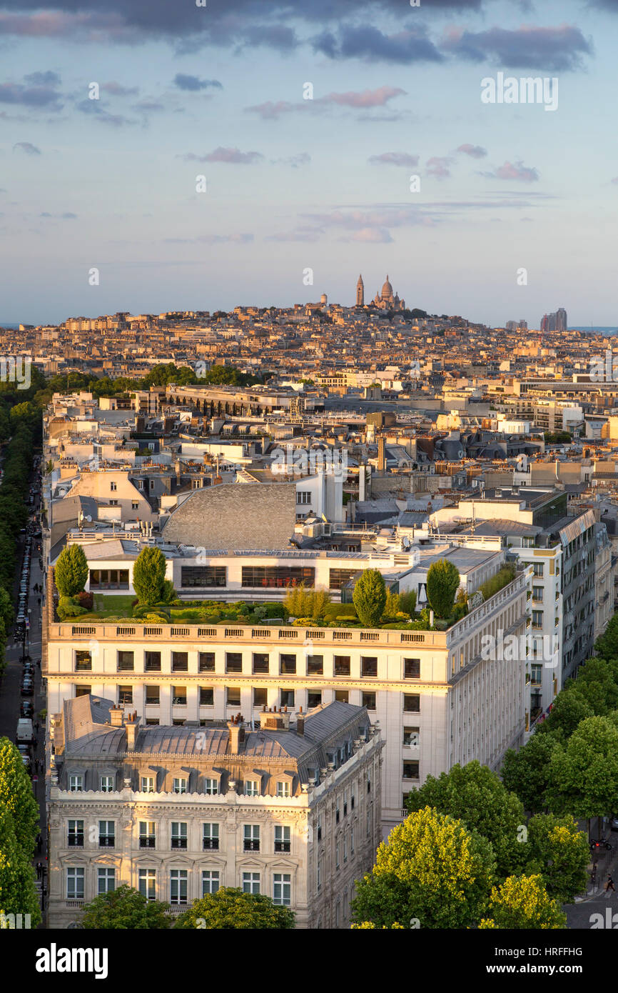 Overhead view of Paris from top of Arc de Triomphe with Basilique du Sacre Coeur beyond, Paris, France Stock Photo