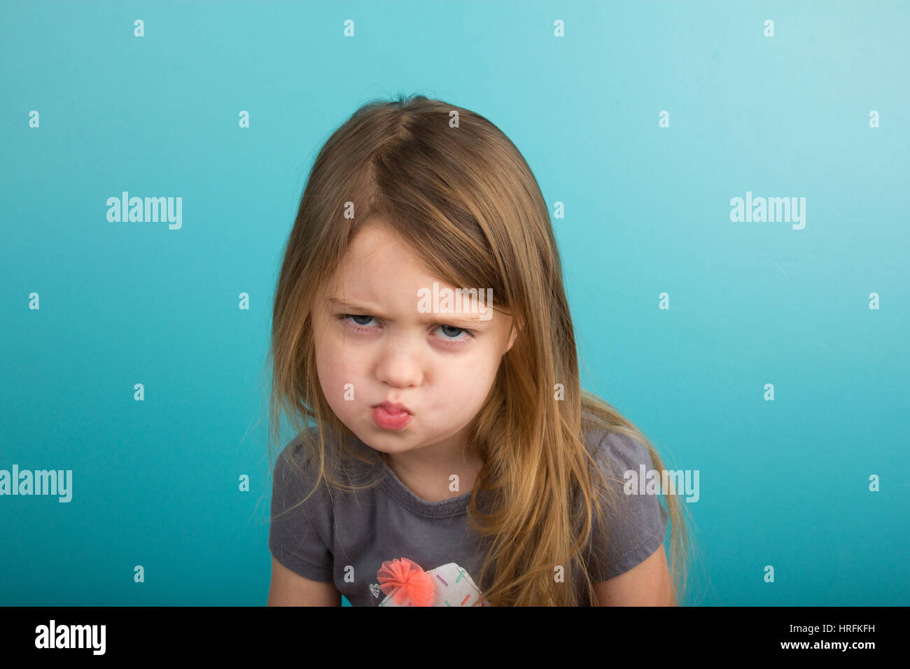 Little girl with sassy expression Stock Photo