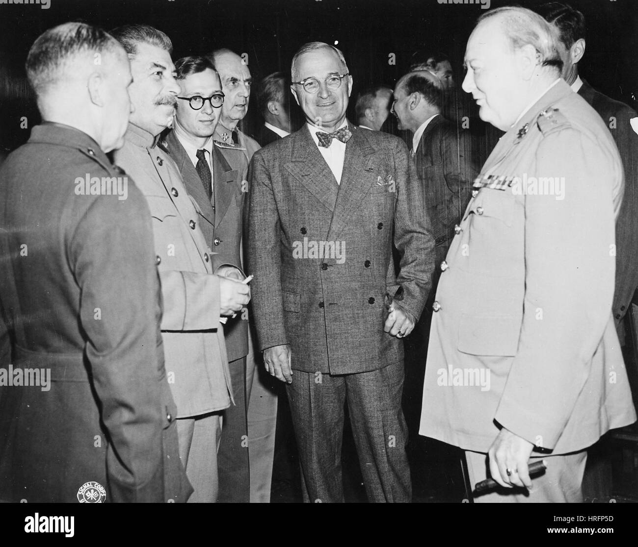 POTSDAM CONFERENCE 1945 Fom left: Joseph Stalin with his interpretor in glasses, Harry Truman facing camera, Winston Churchill Stock Photo