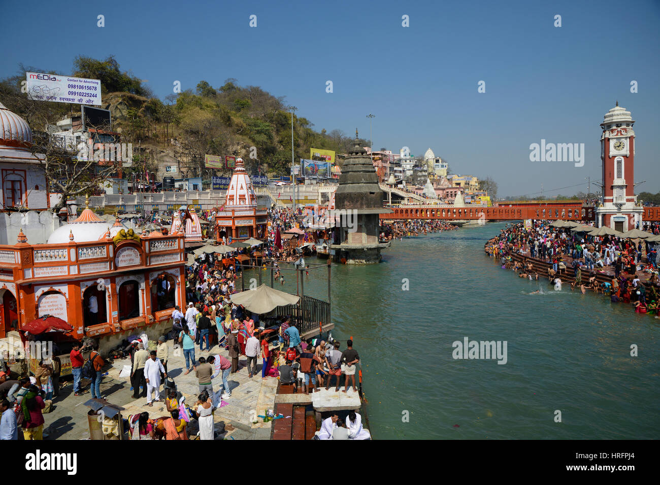 People in ritual bath at the Ganges in the city of haridwar in india Stock Photo