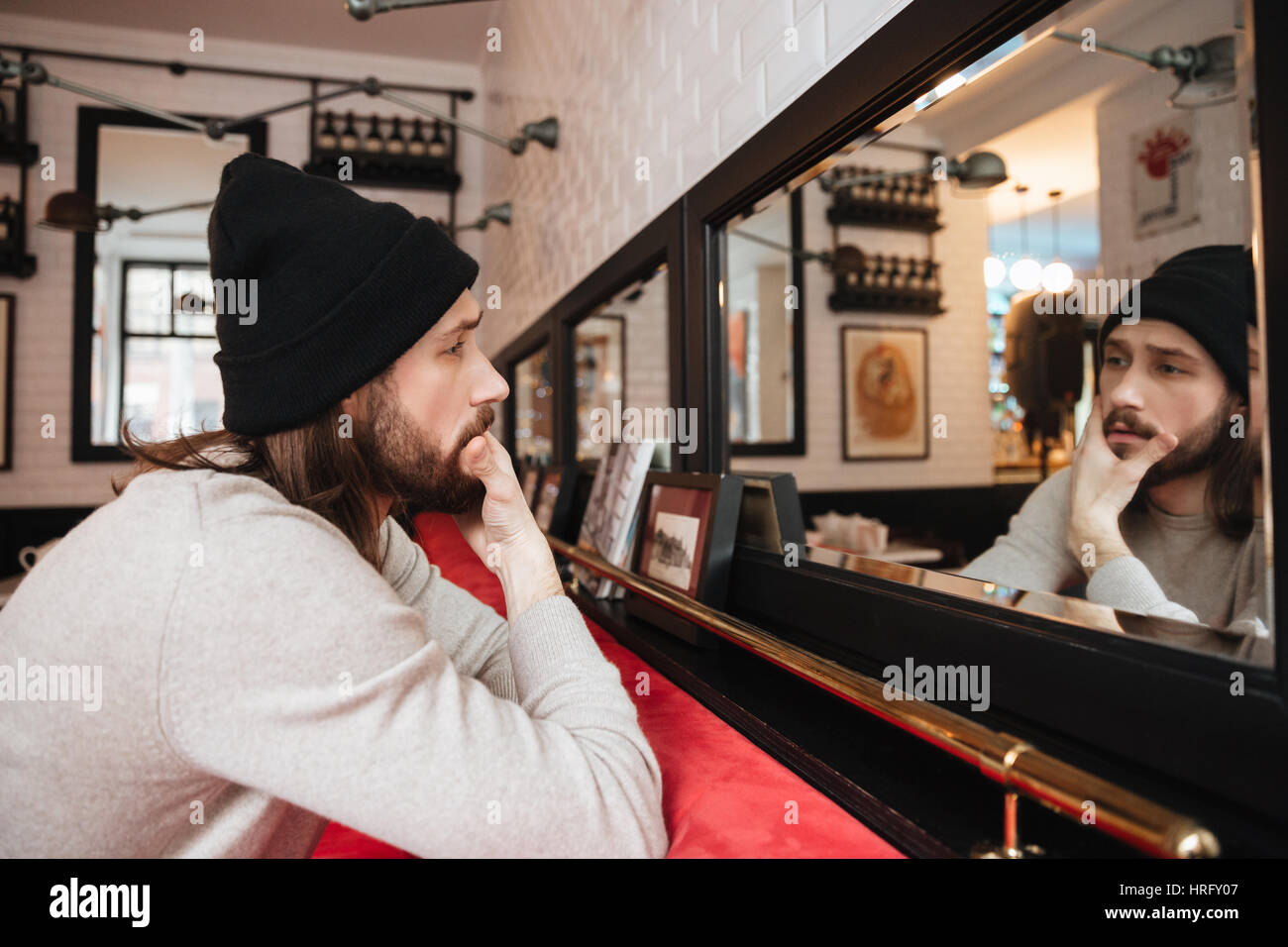 Black hat posing hi-res stock photography and images - Alamy