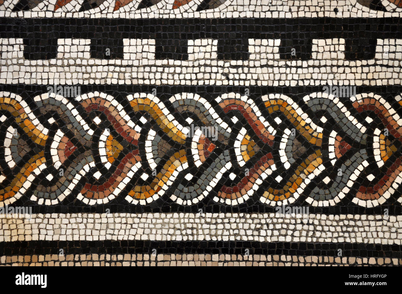 VATICAN, ITALY - MARCH 14, 2016: The mosaic tiled floor in the Greek Cross Hall is one of the major attractions of the Vatican Museum and is visited e Stock Photo