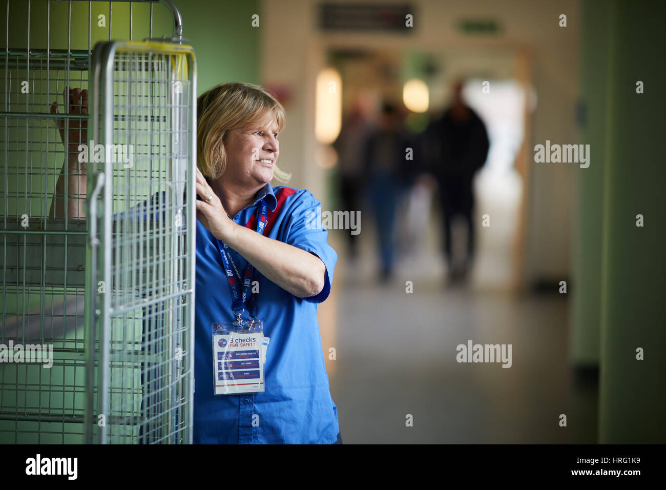 Sodexo porter corridor, interior, working, pushing,Sodexo, Stoke-on-Trent. Stoke University Hospital, Interior, Great Britain, British, United Kingdom Stock Photo