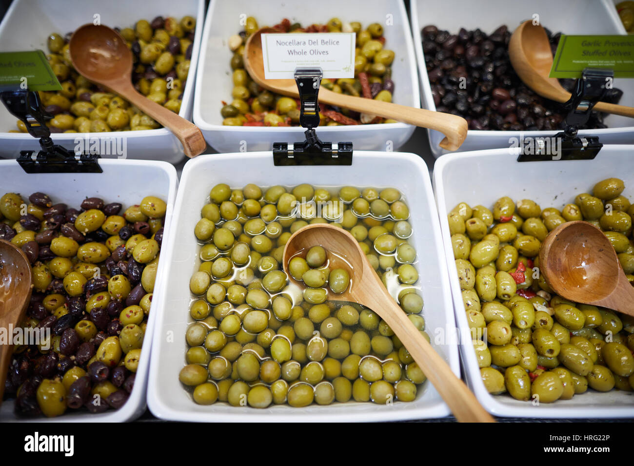 Green Olives in water ready to eat. Stock Photo