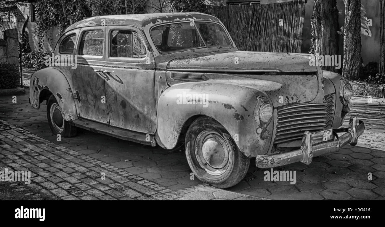 in south africa old abandoned american vintage car and  the house courtyard Stock Photo