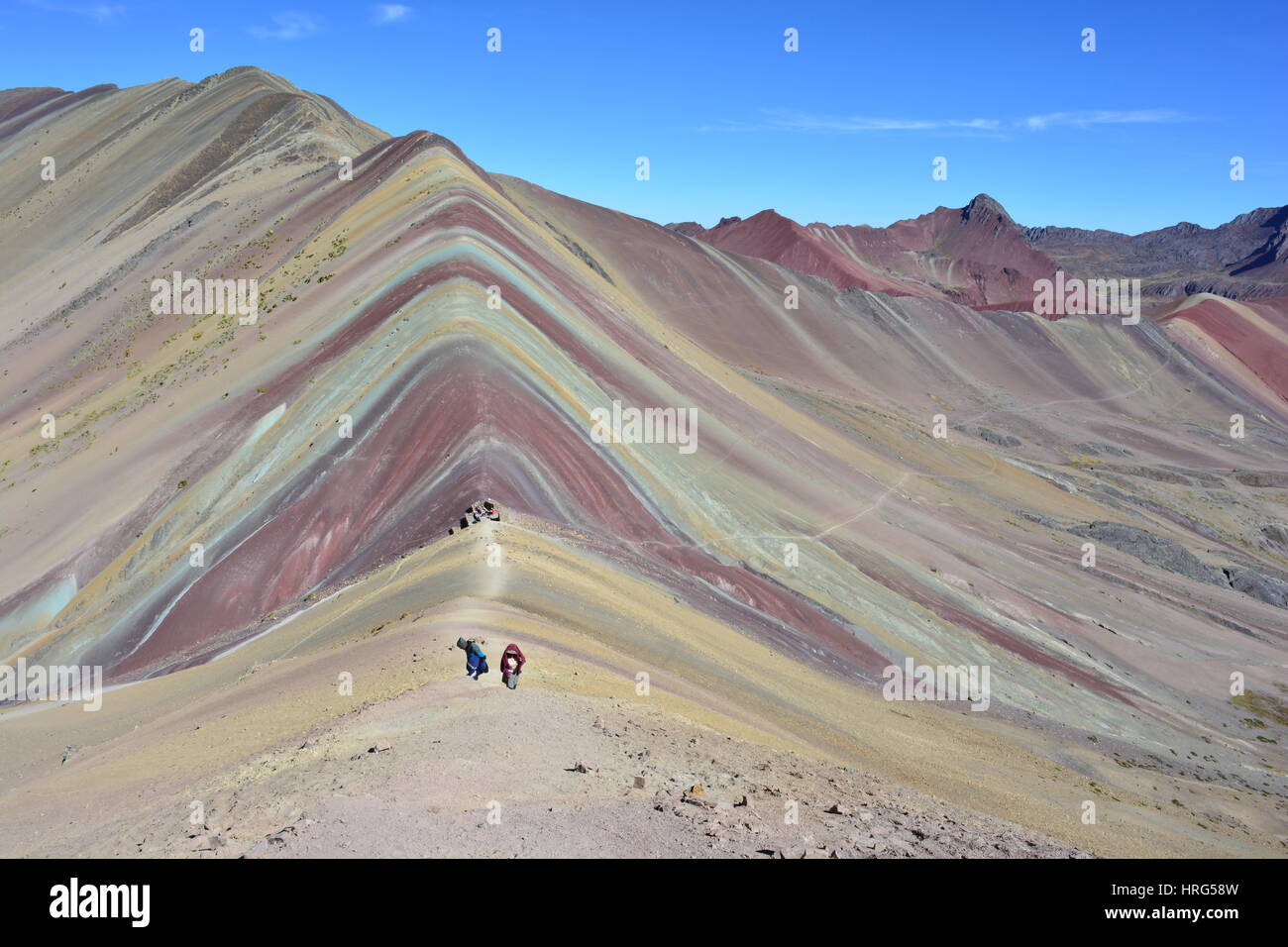 Beautiful landscape of the Cerro Colorado - aka Rainbow Mountain, Vinicunca or Ausangate - in the region of Cusco, Peru Stock Photo