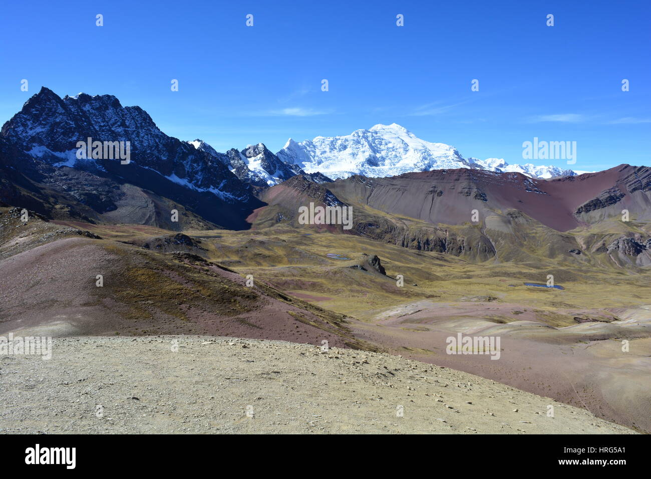 Beautiful landscape of the Cerro Colorado - aka Rainbow Mountain, Vinicunca or Ausangate - in the region of Cusco, Peru Stock Photo