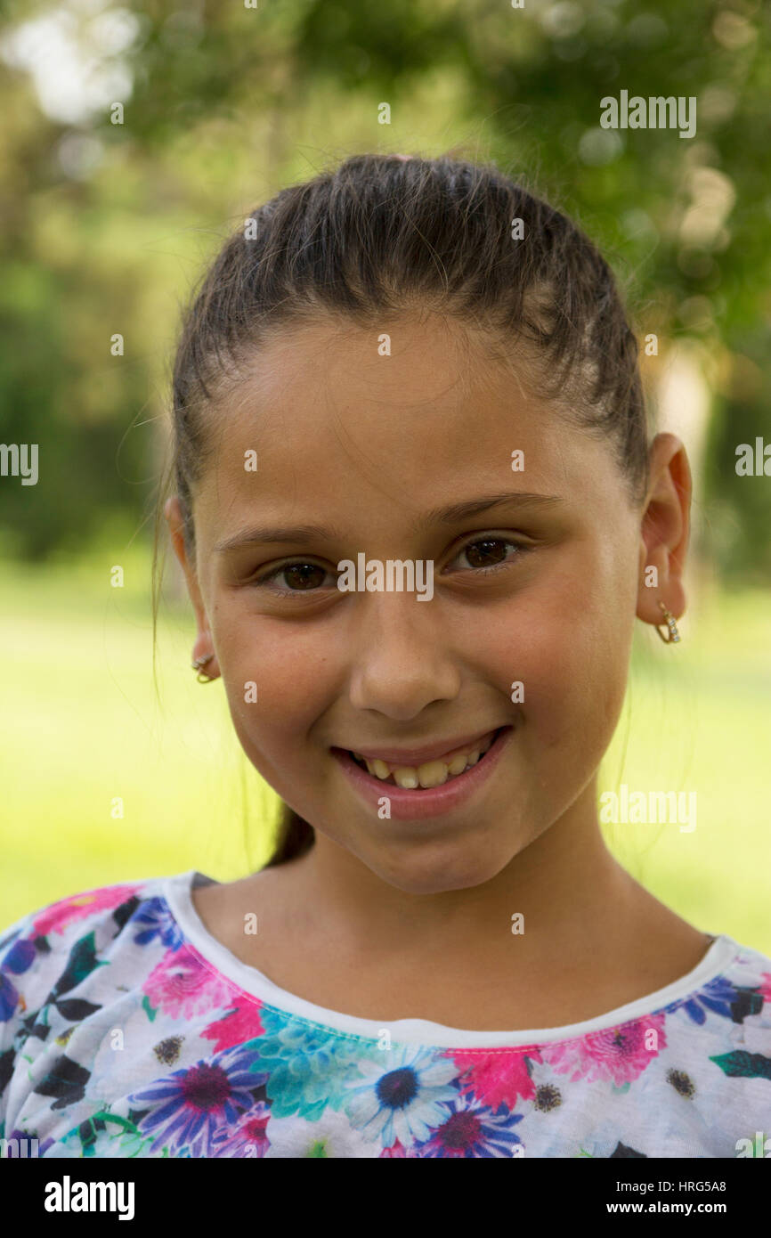 Girl playing in the park, Selective focus and small depth of field ...
