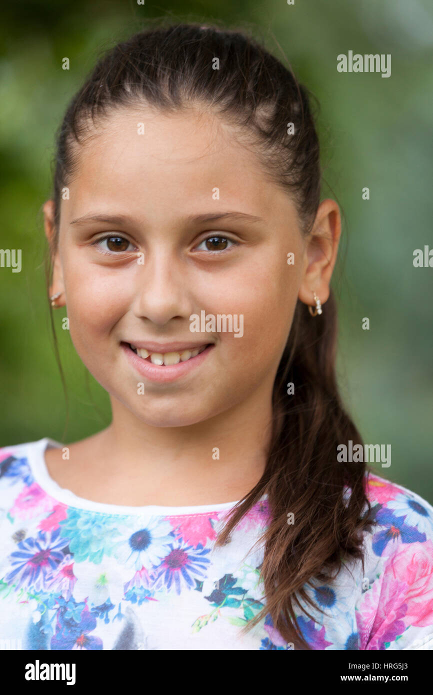 Girl playing in the park, Selective focus and small depth of field ...