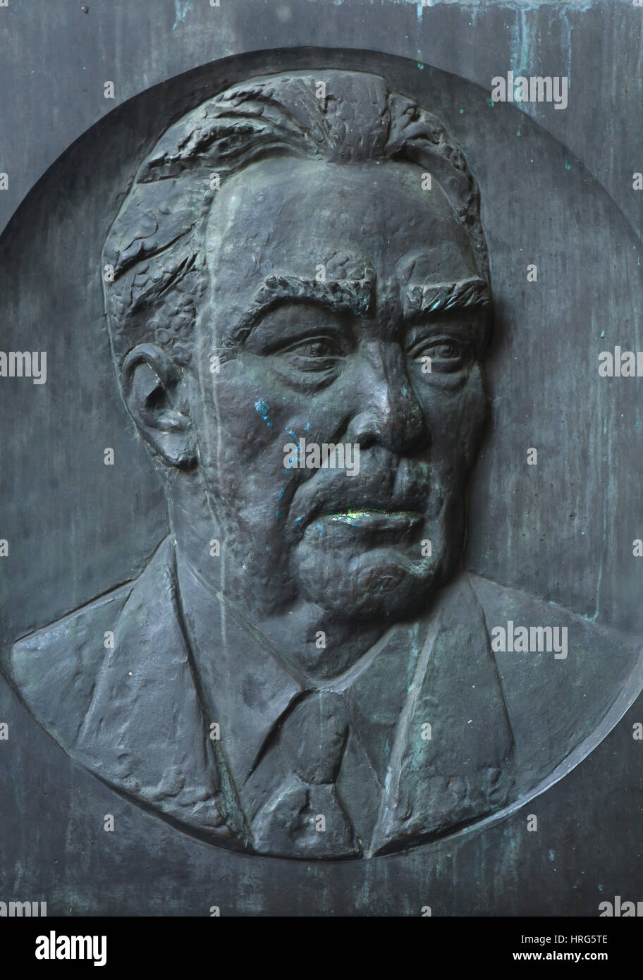 Soviet leader Leonid Brezhnev depicted in the commemorative plaque displayed next to the entrance to the Mauermuseum (Berlin Wall Museum) in Berlin, Germany. The plaque designed by Soviet sculptor Yulian Rukavishnikov (1982) once was installed on the house in Kutuzovsky Avenue in Moscow, Russia, where Leonid Brezhnev lived from 1952 to 1982. After the collapse of the Communist regime in the USSR, the plaque was presented to the Mauermuseum. Stock Photo