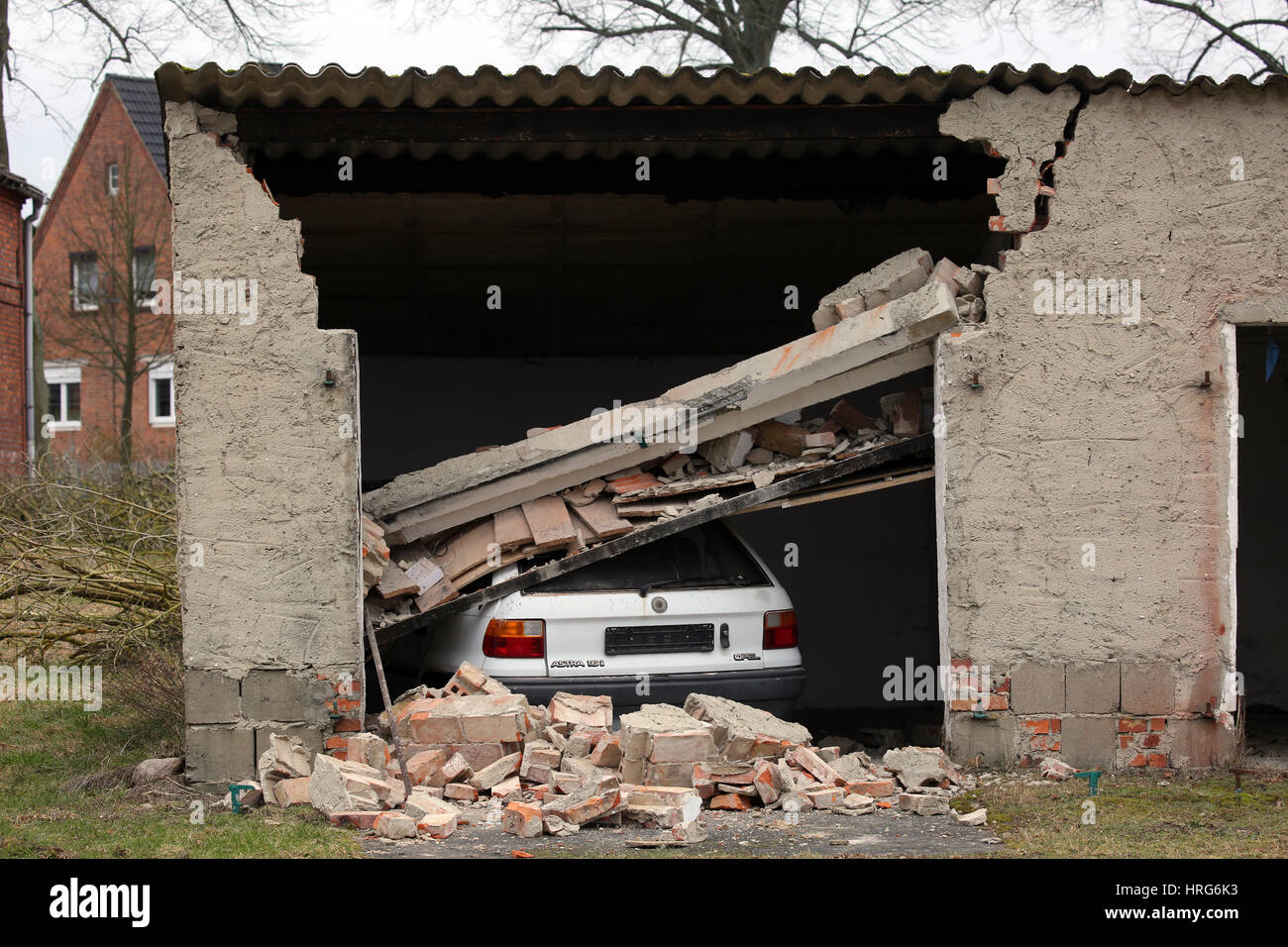 Kummer, Germany. 01st Mar, 2017. A car in a collapsed garage in Kummer, Germany, 01 March 2017. The local fire brigade placed the car here to simulate a car accident rescue situation for training purposes. Photo: Bernd Wüstneck/dpa-Zentralbild/dpa/Alamy Live News Stock Photo