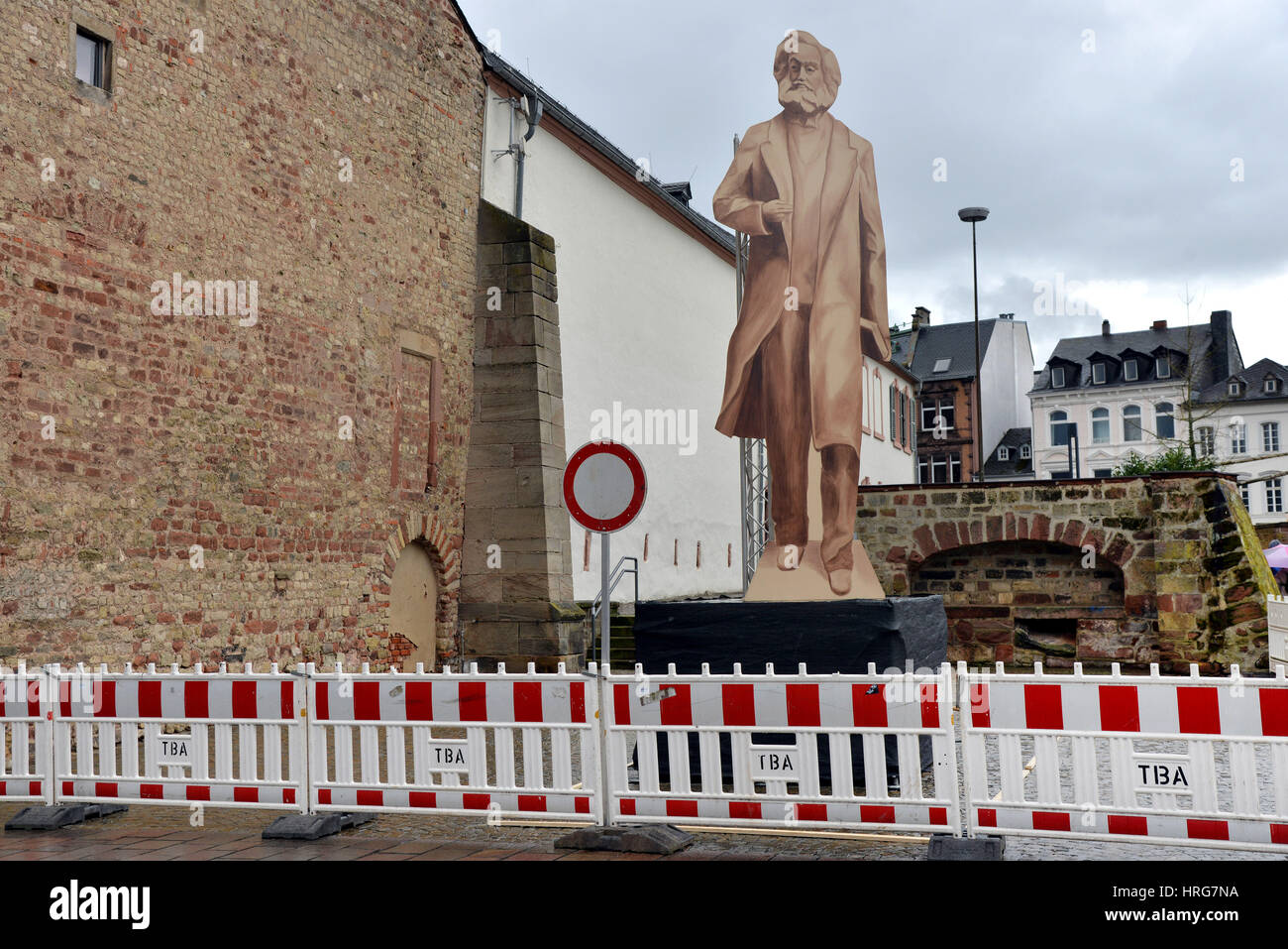 Trier, Germany. 01st Mar, 2017. A wooden cut out of the planned Karl Marx statue, which is to be 6.30 meters high, can be seen in Trier, Germany, 01 March 2017. The People's Republic of China wants to give Trier, the birthplace of Karl Marx, a 'Giant Marx' for his 200th birthday in 2018. Due to its size and the location near the Porta Nigra, it has already triggered criticism so the city wants to give people an impression first with the dummy statue. Photo: Harald Tittel/dpa/Alamy Live News Stock Photo