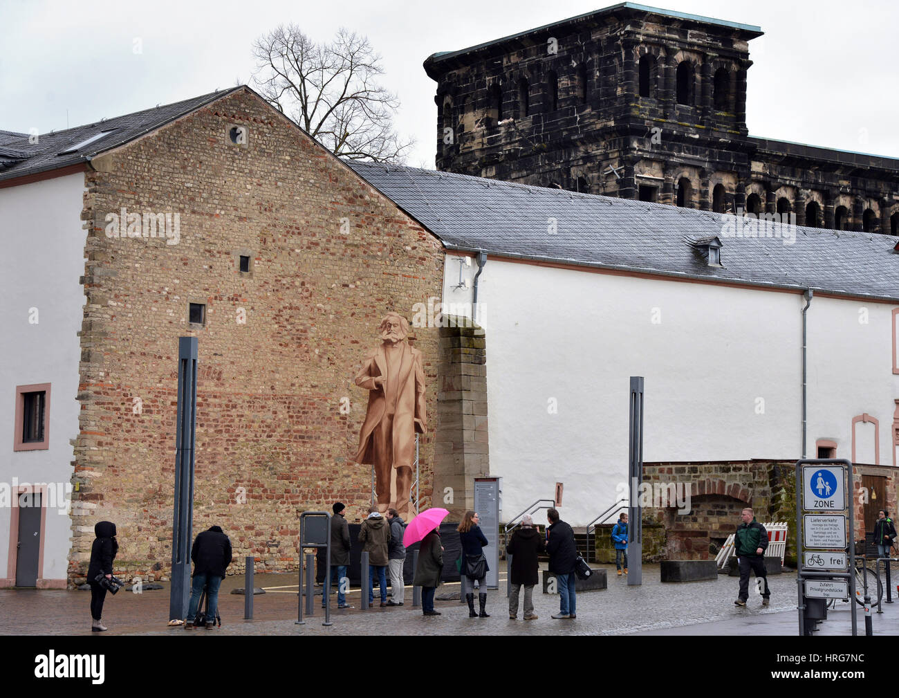 Trier, Germany. 01st Mar, 2017. A wooden cut out of the planned Karl Marx statue, which is to be 6.30 meters high, can be seen in Trier, Germany, 01 March 2017. The People's Republic of China wants to give Trier, the birthplace of Karl Marx, a 'Giant Marx' for his 200th birthday in 2018. Due to its size and the location near the Porta Nigra, it has already triggered criticism so the city wants to give people an impression first with the dummy statue. Photo: Harald Tittel/dpa/Alamy Live News Stock Photo