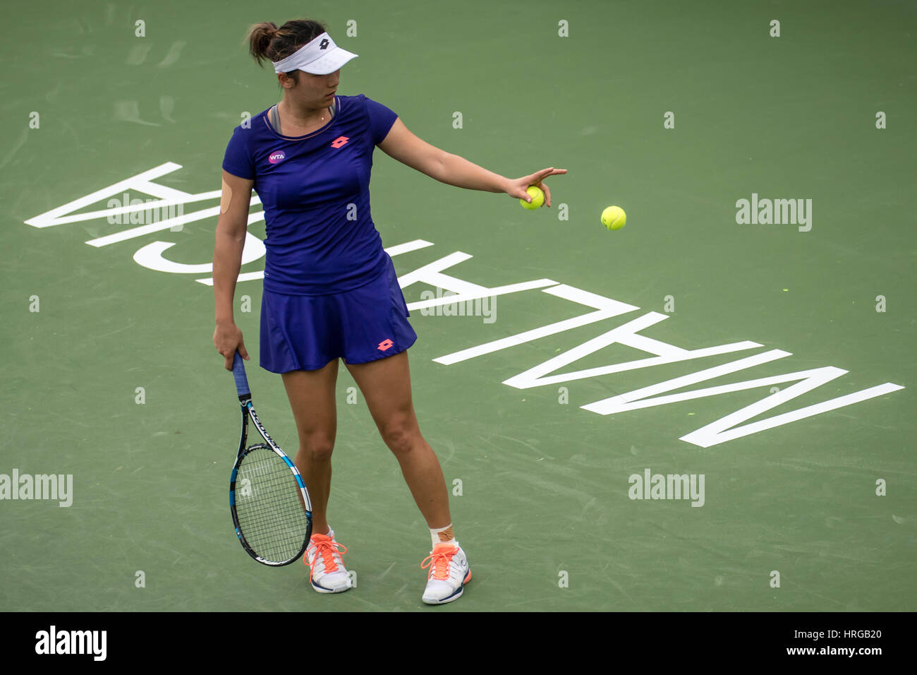 Kuala Lumpur Malaysia 1 March 2017 Tennis Player Kai Lin Zhang Of China Chn Selecting Tennis Balls To Serve To Risa Ozaki Jpn At Alya Wta Malaysian Open 2017 In Kuala Lumpur C