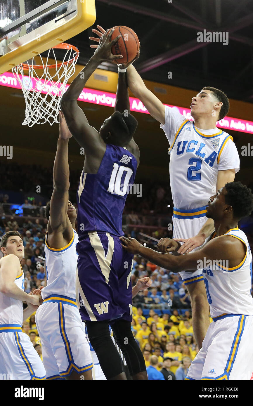 March 1, 2017: Washington Huskies forward Malik Dime #10 goes up for the dunk as UCLA Bruins guard Lonzo Ball #2 tries to block the shot from behind but gets called for the foul in the game between the Washington Huskies and the #3 UCLA Bruins, Pauley Pavilion, Los Angeles, CA Stock Photo