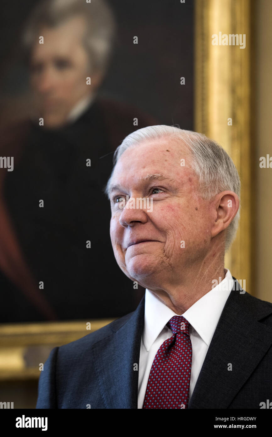 Attorney General Jeff Sessions listens to U.S. President Donald J. Trump speak before Vice President Mike Pence swore Sessions in as the next attorney general in the Oval Office of the White House in Washington, DC, USA, 09 February 2017. On 08 February, after a contentious battle on party lines, the Senate voted to confirm Sessions as attorney general. Credit: Jim LoScalzo / Pool via CNP  - NO WIRE SERVICE - Photo: Jim LoScalzo/Consolidated/dpa | usage worldwide Stock Photo