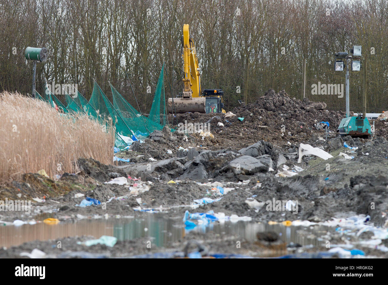 Workmen on Wednesday March 1st at Milton landfill site near Cambridge