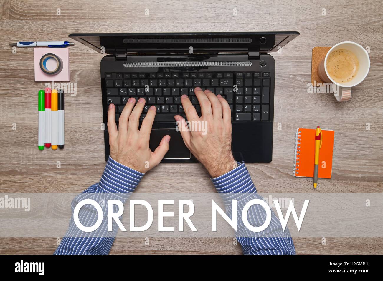 Male hand typing on laptop, message Stock Photo