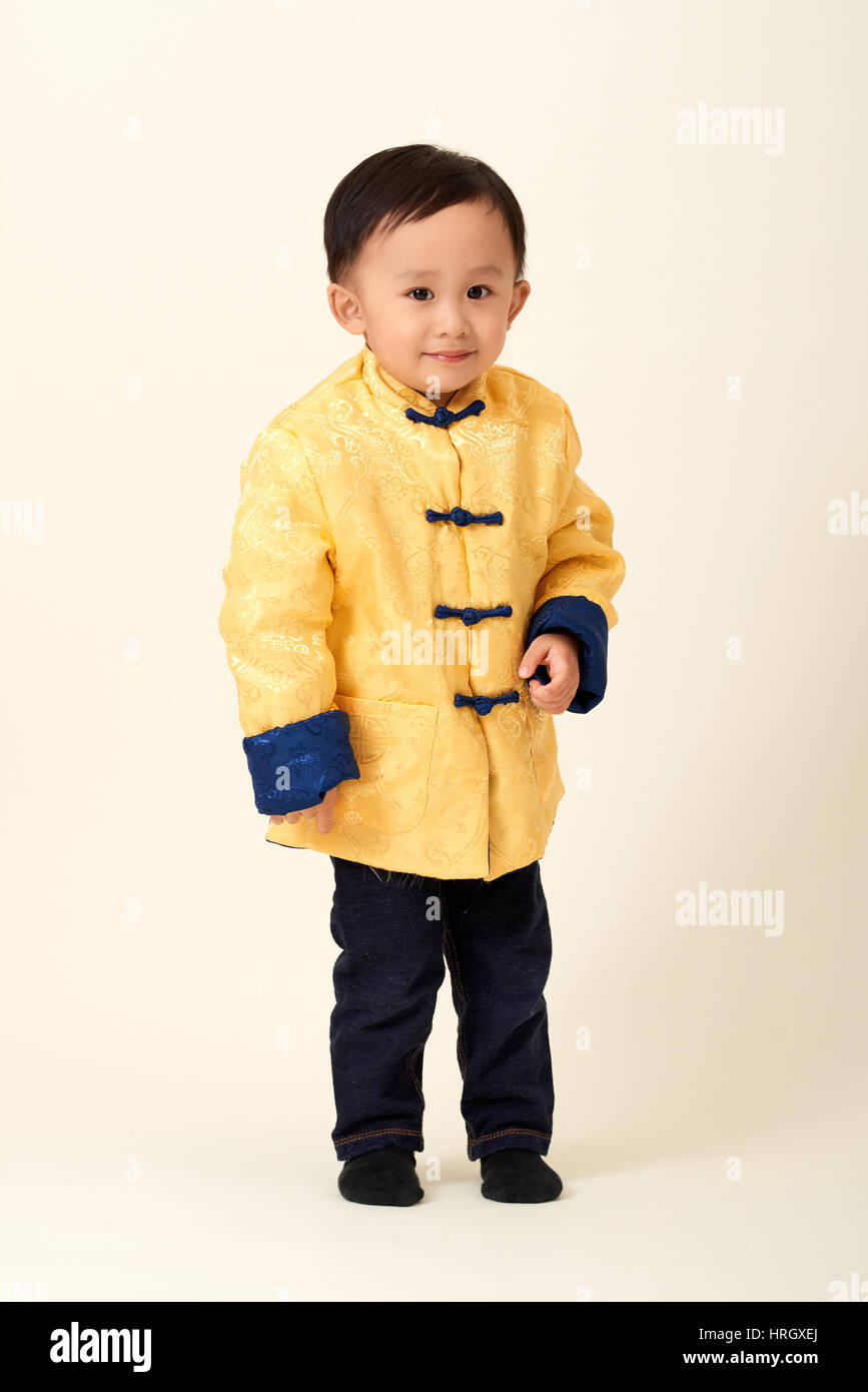Chinese Baby Boy In Traditional Chinese New Year Outfit Celebrating Lunar New Year Stock Photo Alamy