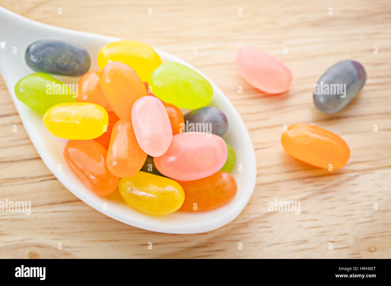 Sweet Sugar Candy in white spoon on sack background Stock Photo Alamy