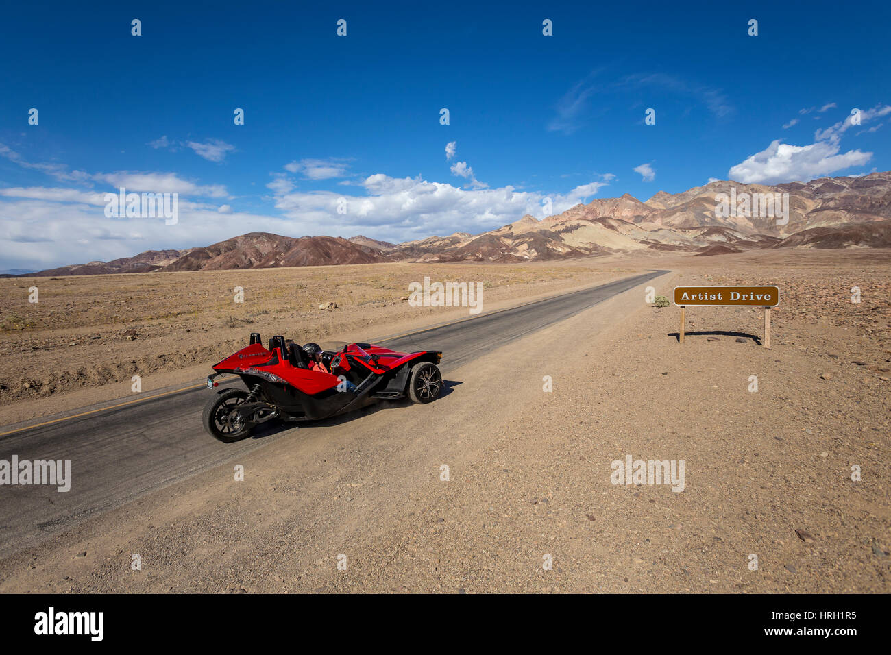 Slingshot 3-wheeled motorcycle, people, tourists, visitors, Artist Drive, Black Mountains, Death Valley National Park, Death Valley, California, Unite Stock Photo