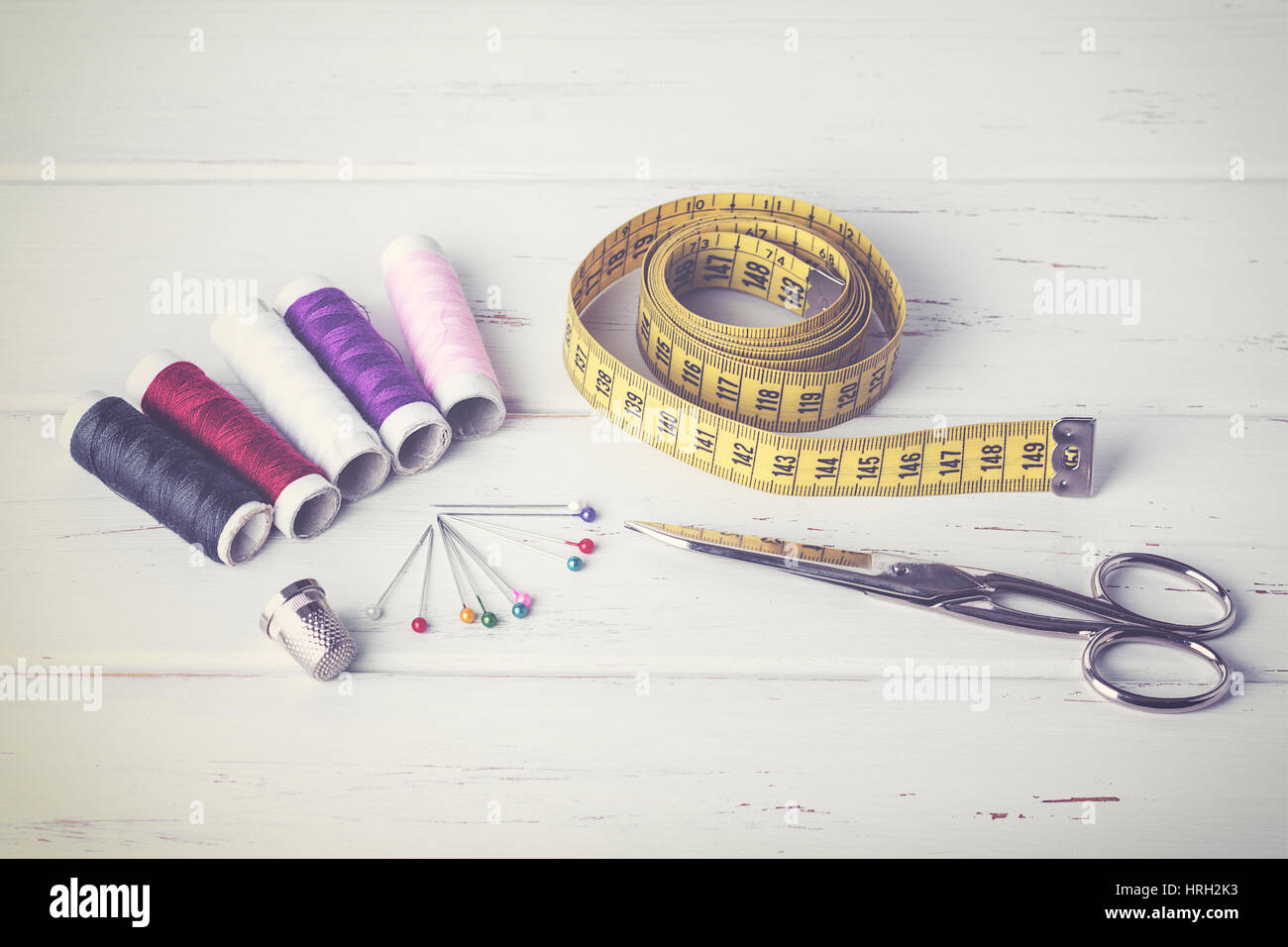 Sewing accessories on wood table Stock Photo Alamy
