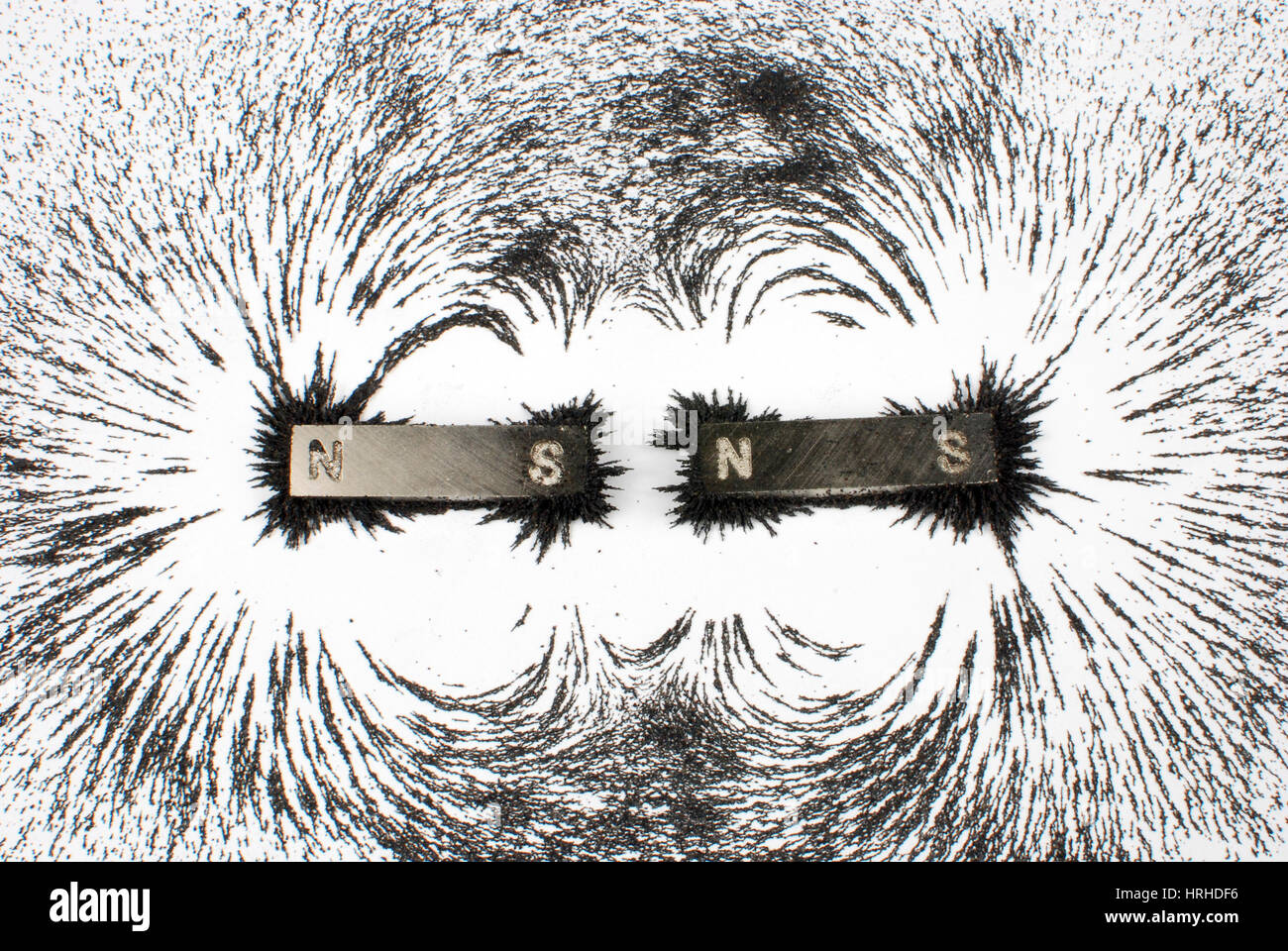 attraction iron filings hires stock photography and images