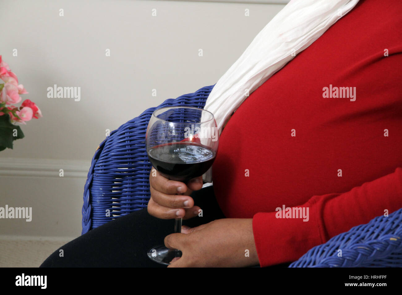 Pregnant Woman Drinking Wine Stock Photo