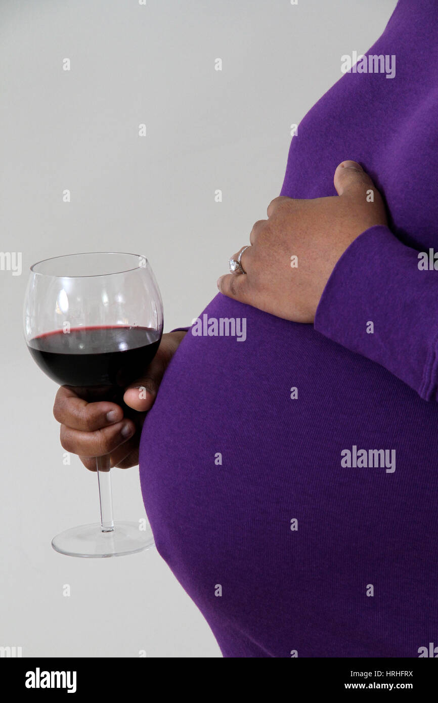 Pregnant Woman Drinking Wine Stock Photo Alamy