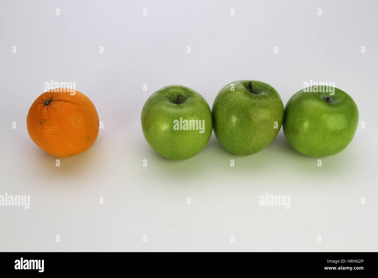 Comparing Apple And Orange High Resolution Stock Photography and Images Alamy