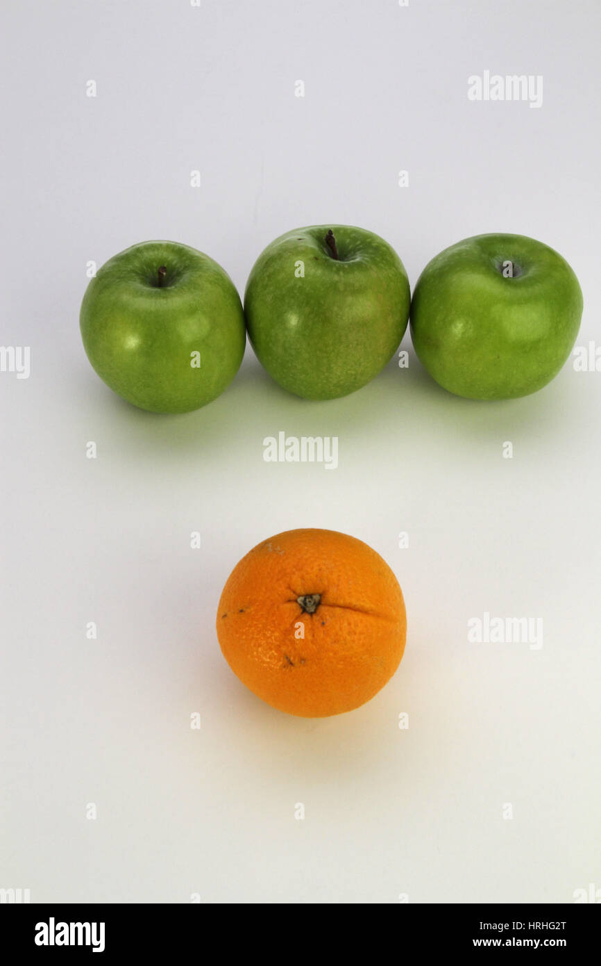 Comparing apples and oranges Stock Photo Alamy