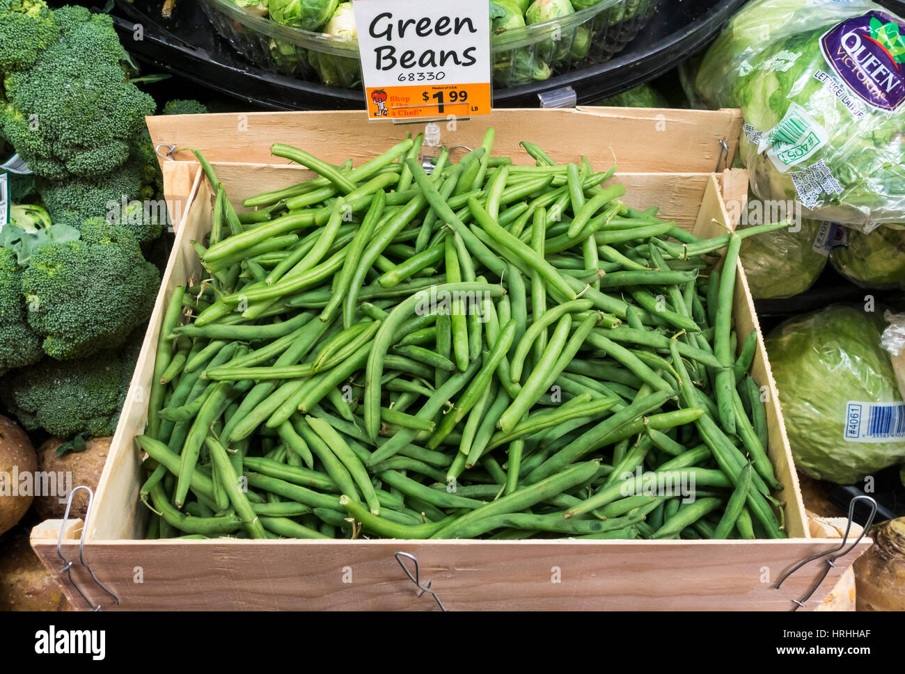 Green beans on display in the produce department of a supermarket Stock