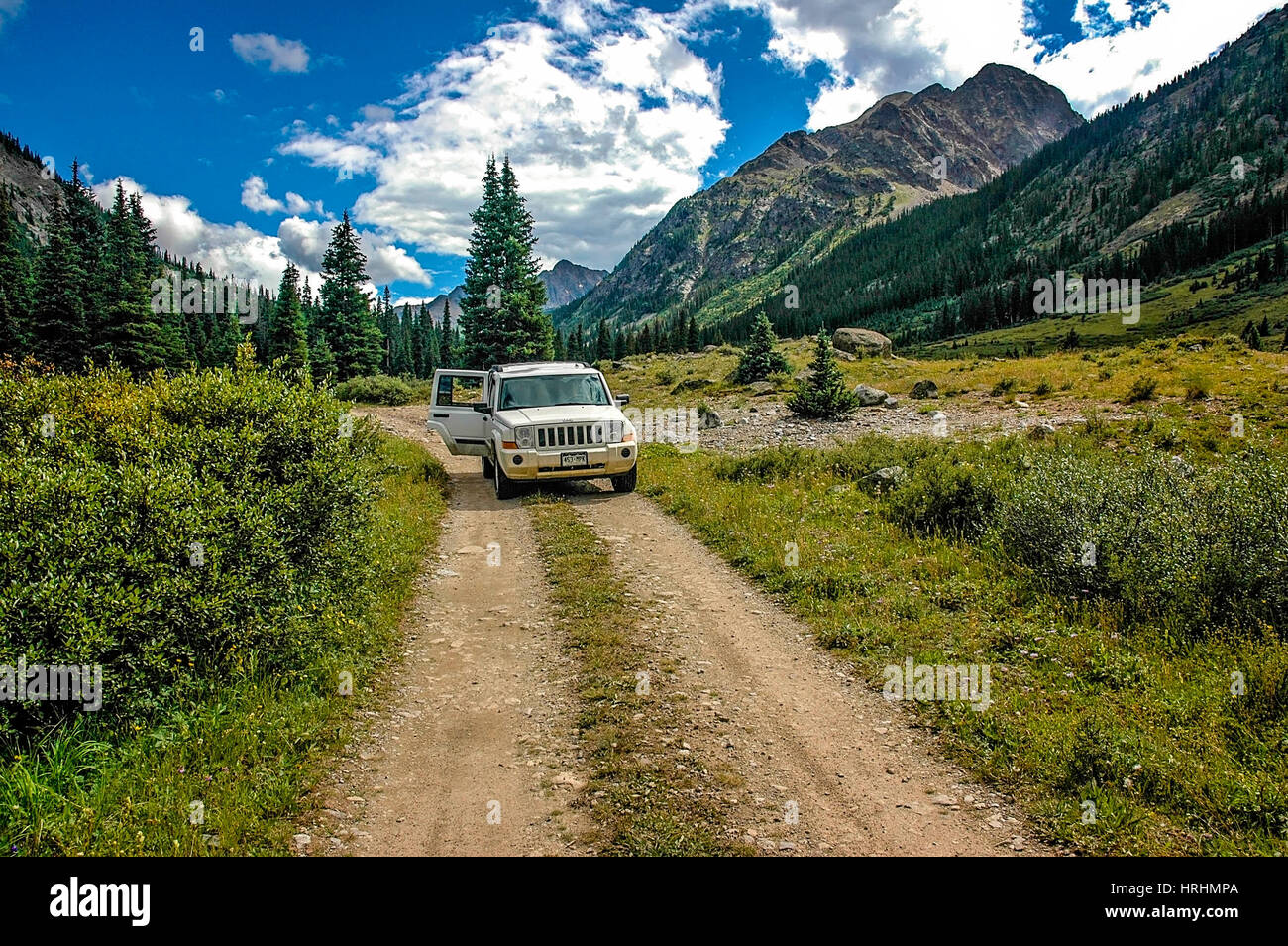 A jeep 'Patriot' on Grizzly Lake offload Trail near Independence Pass in Aspen, Colorado. Stock Photo