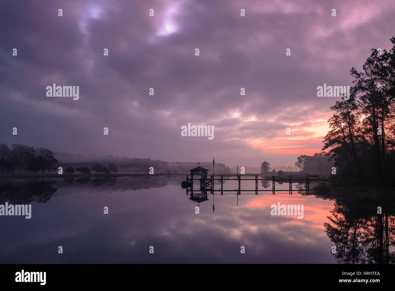 Sunrise and dock on intracoastal waterway, Calabash, North Carolina